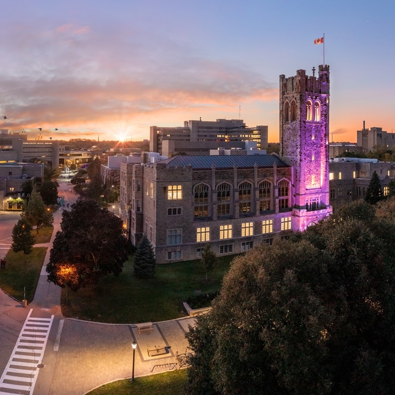 UC Tower with purple lights