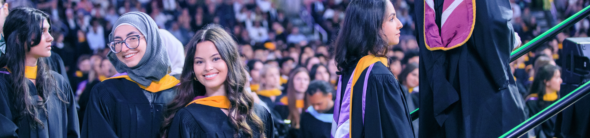 Grads walking across the stage at Canada Life Place