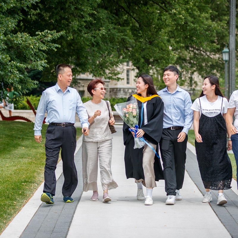 Happy guests walking