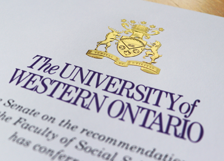 A close up of the Western University crest on a diploma